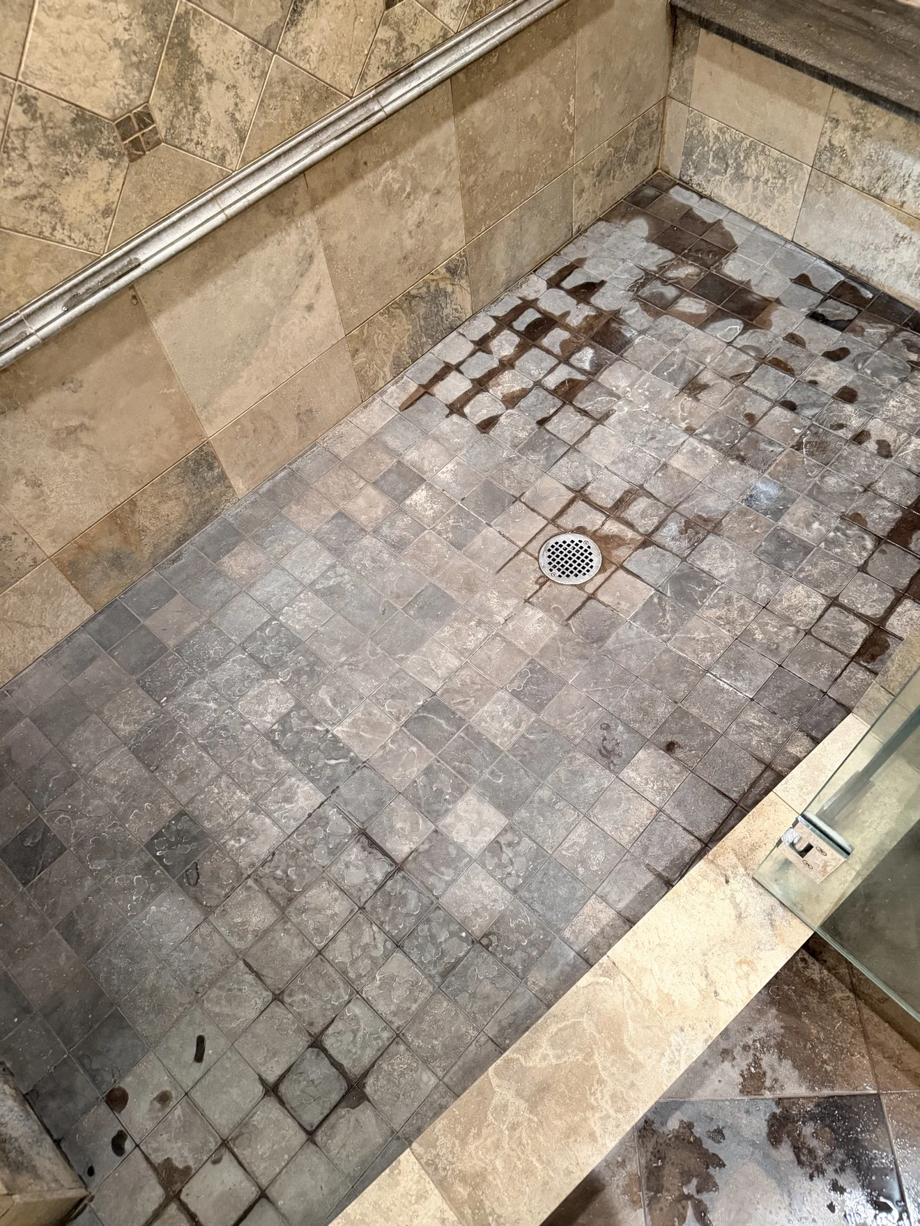Shower floor before cleaning